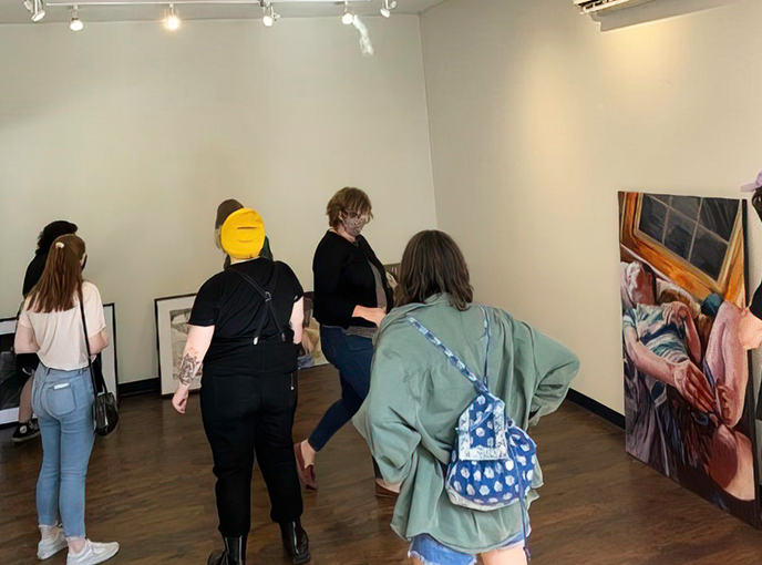 Photo of students at the Logan Street Market Gallery