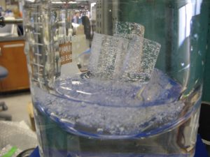 Photo showing a piece of ice core sample that melts under vacuum to release the ancient air bubbles for isotopic analysis.