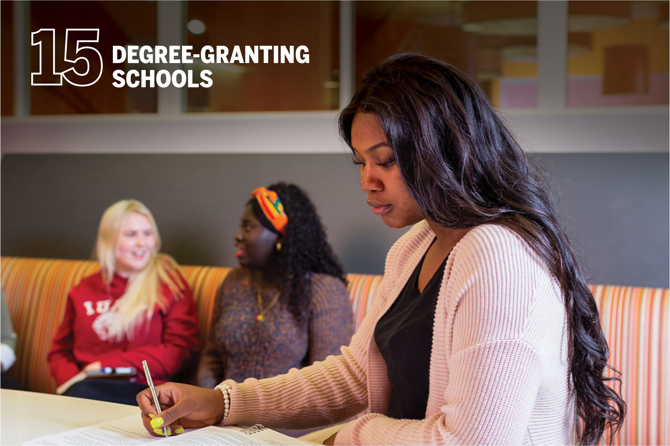 Female student studying. Text on photo says 15 degree-granting schools.