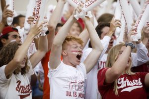 Students cheer during the Traditions and Spirit of IU at Memorial Stadium.