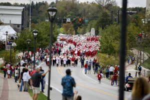 Members of the Marching Hundred perform in the Indiana University Bloomington Homecoming Parade.