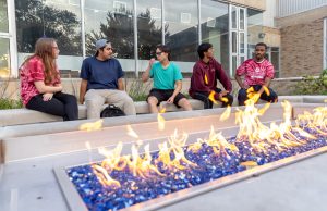 Image of IU Northwest students chatting outside.