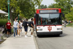 Students getting on an IU campus bus at IU Bloomington.