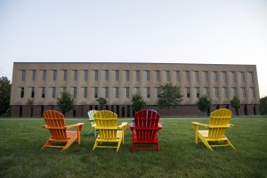 Adirondack chairs outside of Neff Hall on the Indiana University Fort Wayne campus.