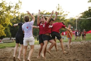 Teter residents participate in a sand volleyball game.