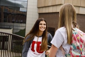 Students chatting on campus at Indiana University Fort Wayne.