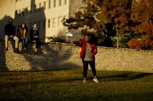 Image of student playing frisbee out on the quad at IU Bloomington.