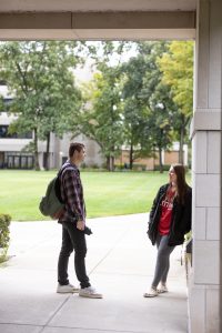 Students chatting on campus at IU South Bend.