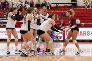 IU Kokomo volleyball team cheers each other on.