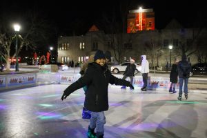A student ice skates during Light Up the Night at IU Bloomington.