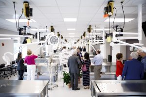 Members of the public tour the Deaconess Hospital Human Structures Suite inside the Stone Family Center for Health Sciences in downtown Evansville.