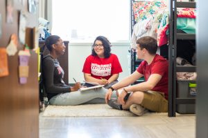 Students chatting in a residence room in North Hall at IU Indianapolis.