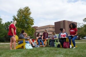 Students chat on beach chairs at IU Fort Wayne.