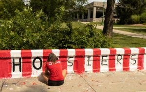 Welcome Week bridge painting and sidewalk chalk drawing at IU Bloomington.