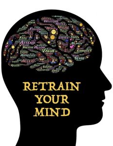 Silhouette of head with text that reads retrain your brain.