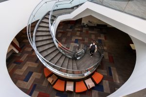 Student walking up stairs at IU Kokomo.