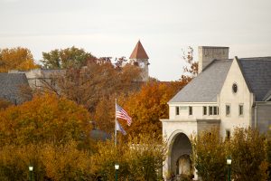 Fall foliage surrounds the Frances Morgan Swain Student Building clock tower.