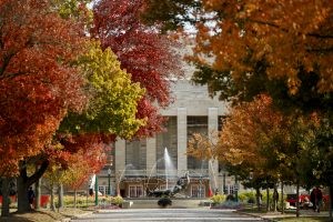 Fall color frames the Showalter Fountain at IU Bloomington.