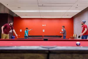 IU Indianapolis students playing ping pong.