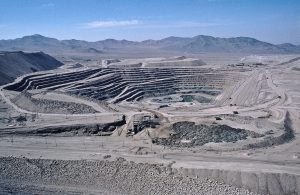 A view of a large open pit copper mine.