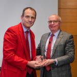 Faculty member receiving award from the Dean