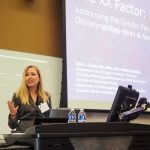 Presenter speaking at podium