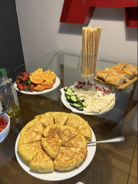 A photo of a variety of foods on a table.