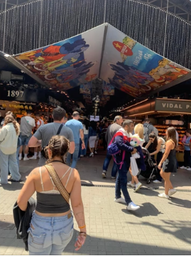 A photo of a group of people outside of a building.