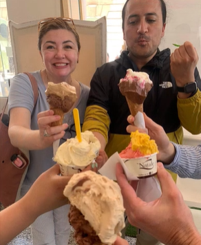 A photo of two people with gelato.