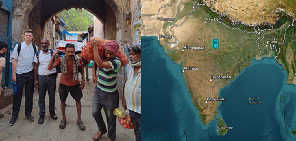 Photo of a student and professor in India next to a map of India.