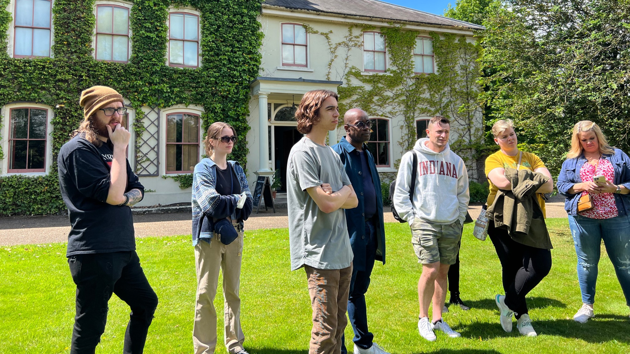 A photo of a group of people outdoors.