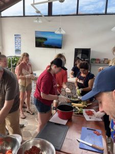 A group of people cooking.