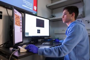 Student studying lab results in Innovation Hall at IU Indianapolis.