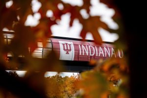 The skywalk over Blackford Street is framed by fall leaves at IU Indianapolis.