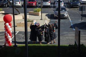 Graduates take a photo before the IU Northwest Commencement.