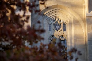Evening light illuminates the side of the Indiana Memorial Union.