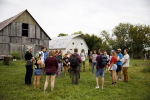 Photo of IU staff giving a tour of the Indiana University Campus Farm.