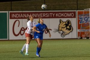 A member of the IU Kokomo's women's soccer team goes for a header.