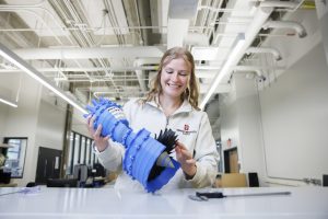 IU Indianapolis student building a model.