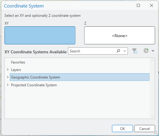 Screenshot of a 'Coordinate System' dialog box in GIS software. The interface includes options to select XY and optionally Z coordinate systems. The XY section is highlighted in blue, and the Z section displays ''. A search bar and a list of coordinate system categories—Favorites, Layers, Geographic Coordinate System, and Projected Coordinate System—are shown below. 'OK' and 'Cancel' buttons are located at the bottom.