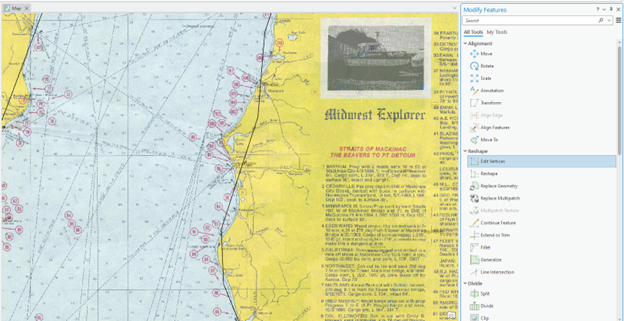Nautical chart of the Straits of Mackinac showing water depths, red numbered navigational markers, and coastal features. The left side displays blue water with depth contours; the right side shows a yellow landmass with labeled coastlines. An inset in the top right corner features a photo of the ship 'Midwest Explorer' and descriptive text about the straits, including historical and navigational details.
