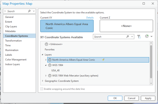 Screenshot of the "Map Properties: Map" window in GIS software. The left panel lists property categories including General, Extent, Metadata, and Coordinate Systems (selected). The right panel displays coordinate system settings, showing "North America Albers Equal Area Conic" as the Current XY system and "" for Current Z. A list of available XY coordinate systems includes options like WGS 1984 and Web Mercator. Buttons labeled OK, Cancel, and Apply appear at the bottom.