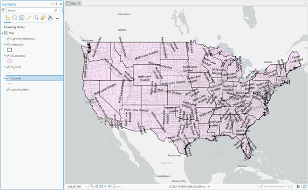 Map of the United States displaying major highways and roads, including multi-lane divided highways and primary routes. Roads are highlighted in pink with black labels indicating names and types. A left panel lists map layers: "Map," "Light Gray Reference," "USA_ewslines," "USA_roads," and "Light Gray Base."