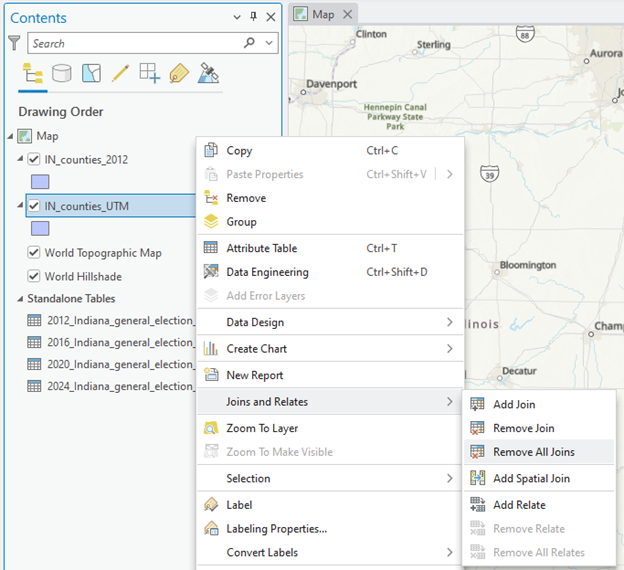 Screenshot of GIS software showing a map of Illinois with cities like Bloomington and Decatur. The left contents panel lists map layers and standalone tables for Indiana elections from 2012 to 2024. A context menu is open with options for managing layers and data, including attribute tables, joins, charts, and reports.