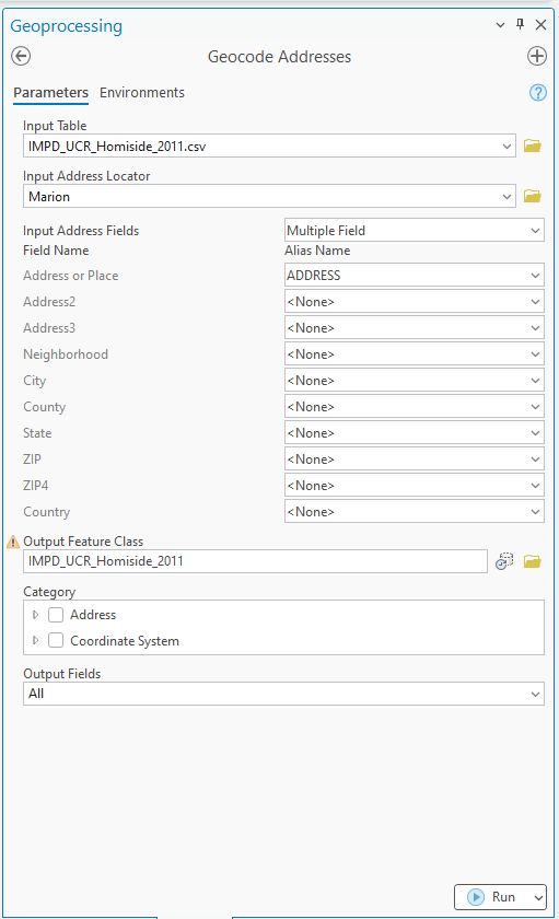 Screenshot of the Geoprocessing pane in ArcGIS Pro showing the “Geocode Addresses” tool. The Parameters tab is active. The Input Table is set to IMPD_UCR_Homicide_2011.csv, and the Input Address Locator is Marion. Below, the Input Address Fields section lists fields such as Address or Place, Address2, Address3, Neighborhood, City, County, State, ZIP, ZIP4, and Country, with most set to except Address or Place mapped to ADDRESS. The Output Feature Class is named IMPD_UCR_Homicide_2011. Additional options include Category (Address and Coordinate System) and Output Fields set to All. A Run button appears at the bottom right.