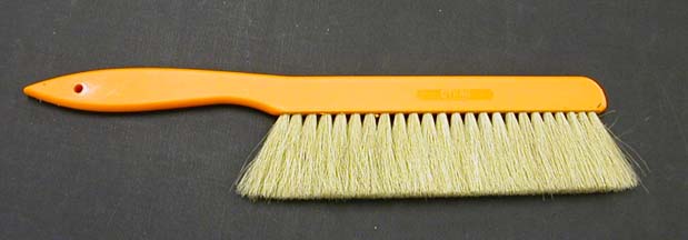 Utlility brush for cleaning work surfaces
