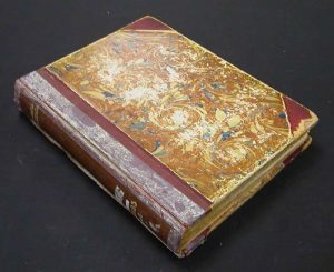 Book that is a candidate for a corrugated clamshell
