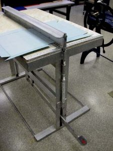 Board being creased on the crimper