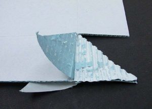 Delaminating the triangular flaps