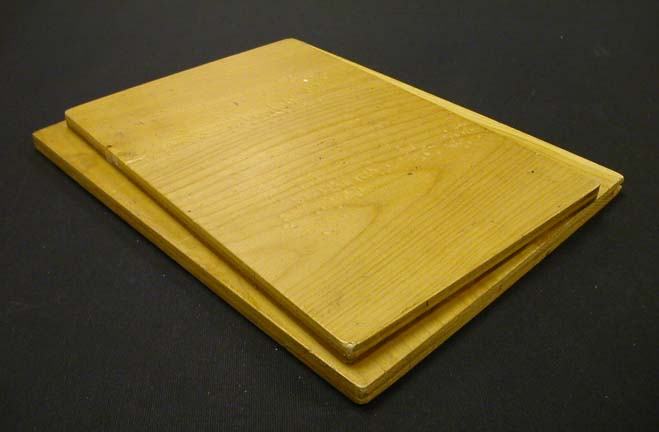 Two flat wooden boards